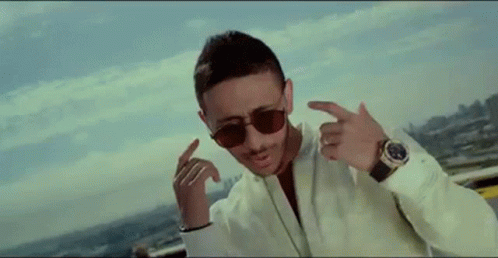 Singing Pointing GIF - Singing Pointing Sunglasses GIFs