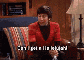 a man is sitting on a couch saying can i get a hallelujah .