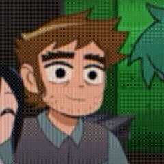 a close up of a cartoon character 's face with a blurred background .