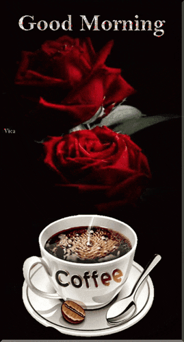 a cup of coffee on a saucer with a spoon and the words good morning