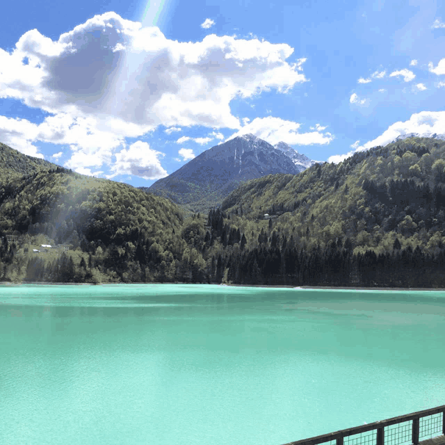 a lake with a mountain in the background