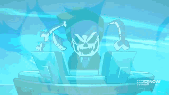 a cartoon character with a skull face is sitting at a desk in front of a laptop