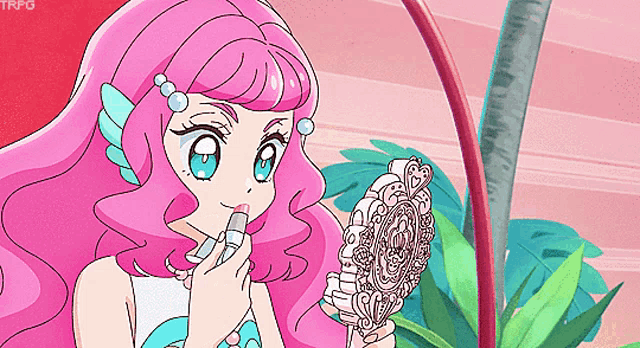 a girl with pink hair is applying lipstick and holding a mirror
