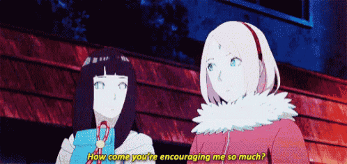 a couple of anime girls are standing next to each other and talking .
