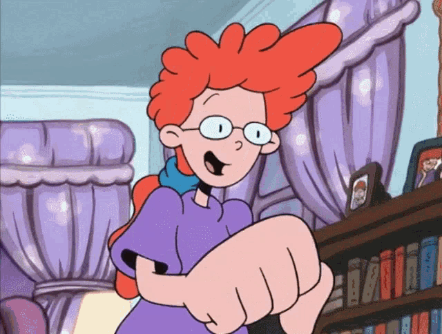 a cartoon character with red hair and glasses is pointing