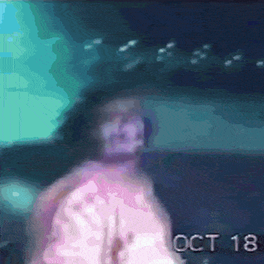 a blurry picture of a person with the date oct 18 on the bottom