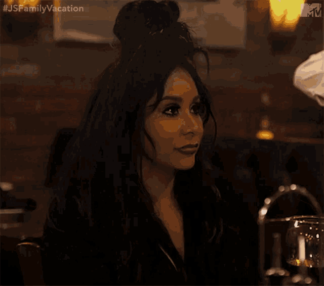 a woman says i feel funny while sitting at a table in a restaurant
