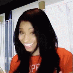 Happy Minaj GIF - Smiling Nickiminaj Readingtext GIFs