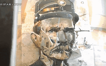 a gif from gifax-net shows a statue of a man 's face