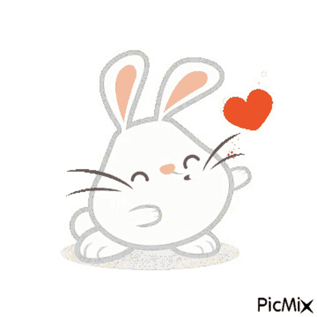 a picture of a white bunny with a heart in its mouth