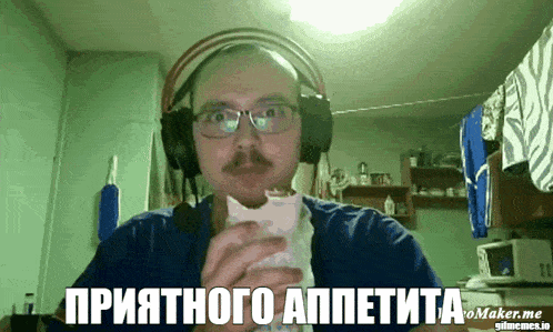 a man wearing headphones and a mustache eating a sandwich with maker.me written on the bottom