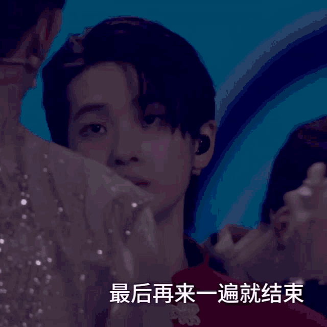 a close up of a person 's face with the word rise in the corner