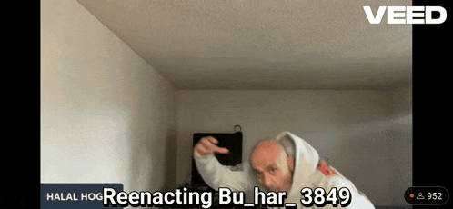 a man in a hoodie is dancing in a room with the words halal hoo reenacting bu_har_38469 on the screen