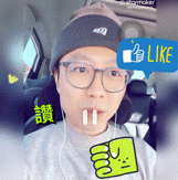 a man wearing glasses and a beanie has a thumbs up speech bubble above his head
