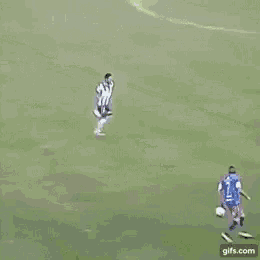a soccer player wearing a blue jersey with the number 2 on it