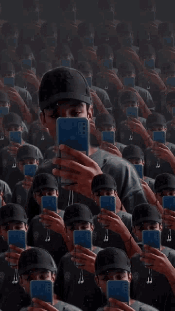 a man in a hat is taking a picture of himself in a mirror