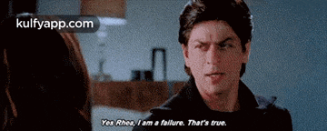 a man is talking to a woman and says yes rhea , i am a failure .