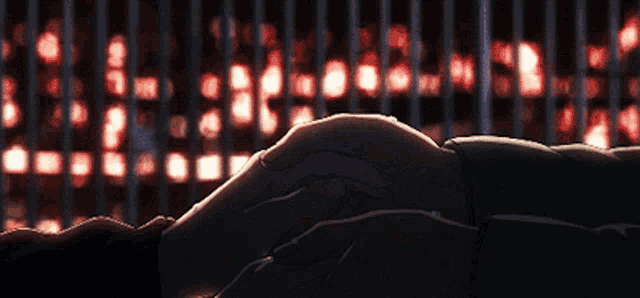 a person laying on a bed with a blurry background of lights