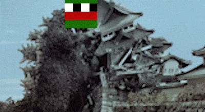 a black and white photo of a destroyed building with a green and red square on top of it