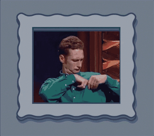 a picture of a man in a green shirt