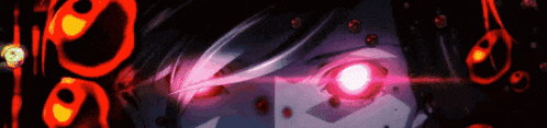 a close up of a person 's eyes with glowing red eyes .