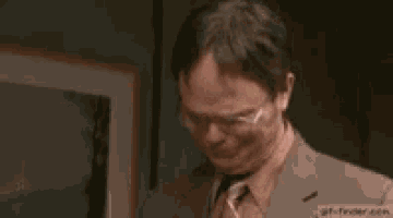 a man in a suit and tie is crying and saying thank you
