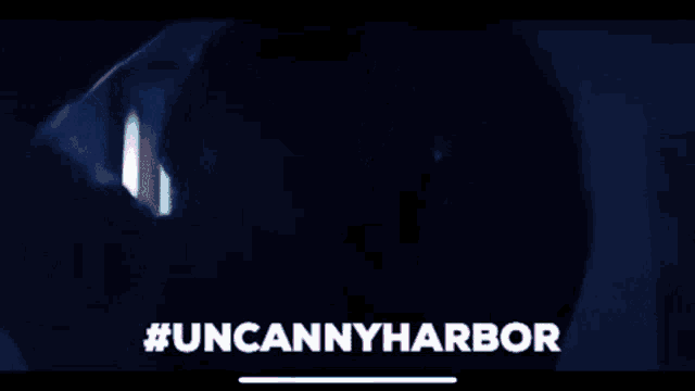 a blue background with the words #uncannyharbor
