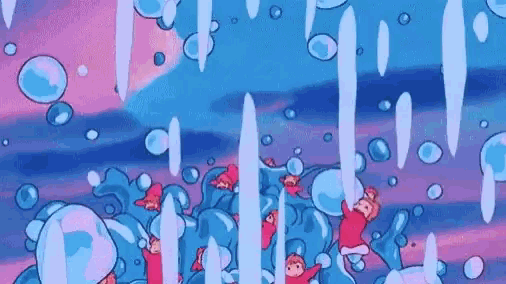 a group of fish are swimming in the ocean surrounded by bubbles and ice .