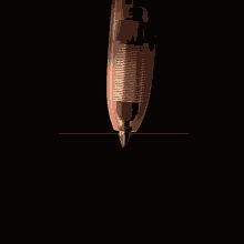 a pixelated image of a pencil writing on a black surface