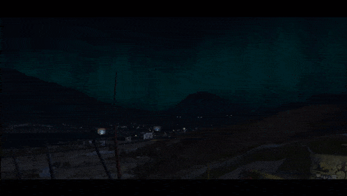 a dark scene with a few trees and a sign that says ' i 'm sorry '