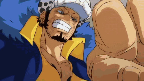 a man with a beard and a hat is laying down in a bed .