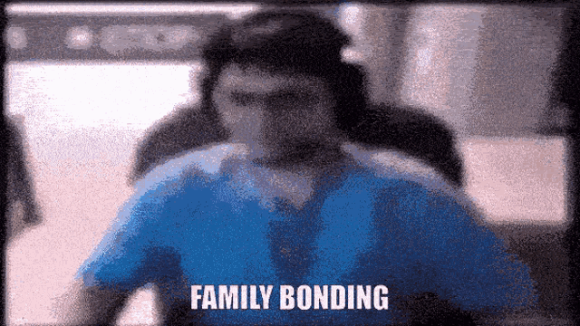 a blurry picture of a man with the words family bonding written on it