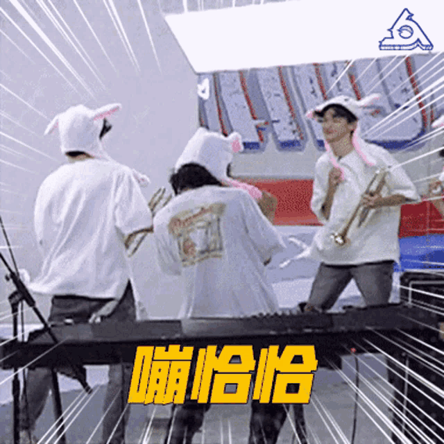 a group of people wearing bunny hats are playing instruments in front of a sign that says ao