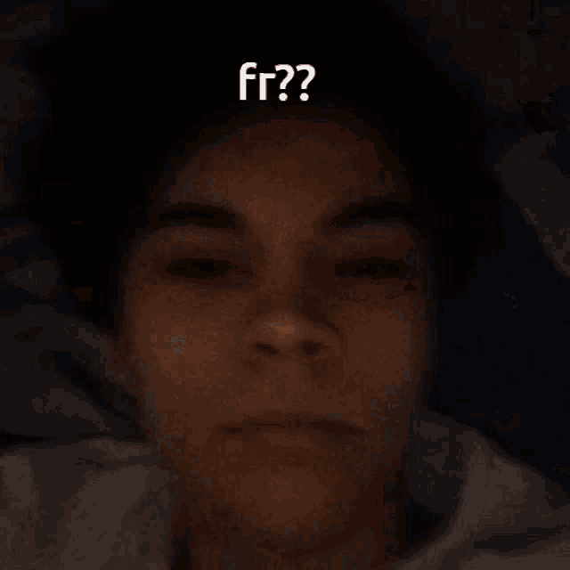 a close up of a woman 's face with a question mark on her forehead that says " fr "