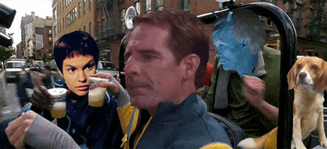 a group of people are sitting in a car with a dog and a man with a blue mask on his face