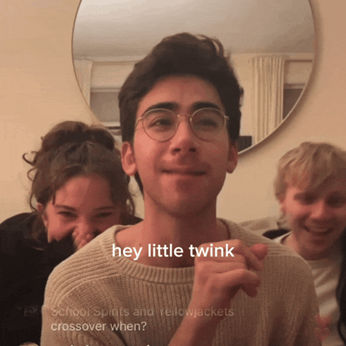 a young man with glasses says " hey little twink "
