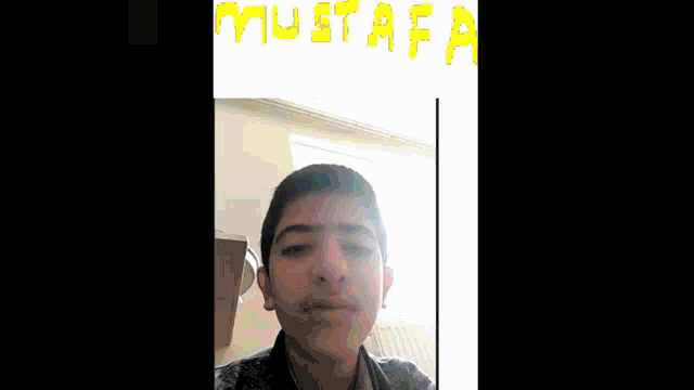 a pixelated image of a person 's face is displayed on a black screen