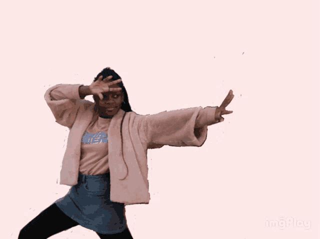 a girl wearing a pink jacket and a t-shirt that says ' i love you ' on it