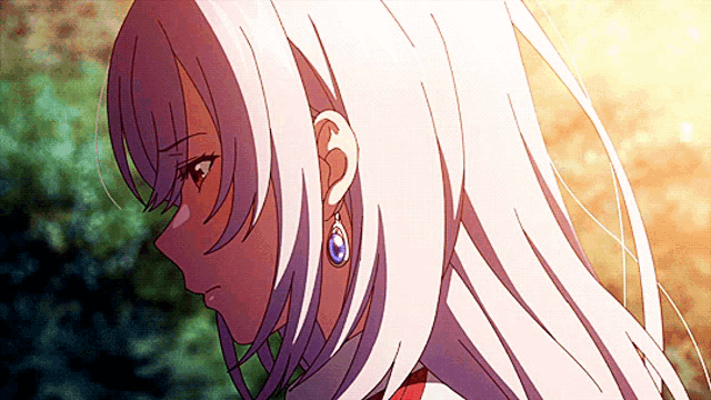 a close up of a girl 's face with white hair and earrings