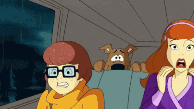 a scooby doo cartoon shows a woman and a dog
