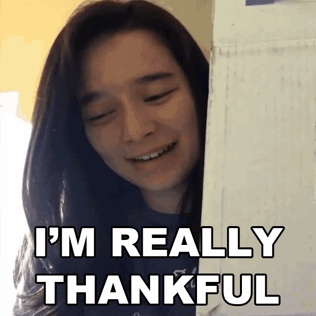 a woman says i 'm really thankful behind a box