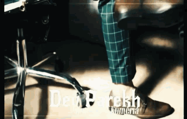 a person 's feet are shown in a video with the name deb parekh