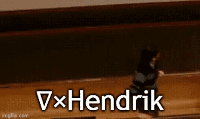 a blurry picture of a person with the name vxhendrik written on it