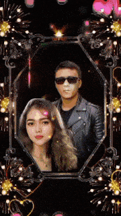 a man and a woman are in a picture frame with fireworks in the background