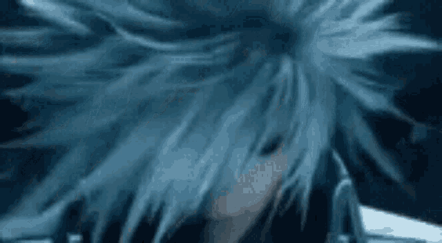a close up of a person 's hair in a dark room