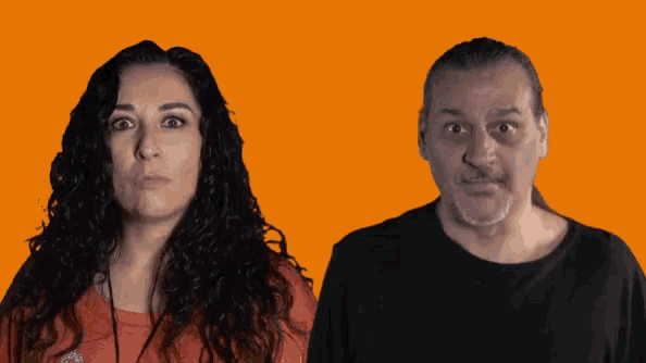 a man and a woman standing next to each other