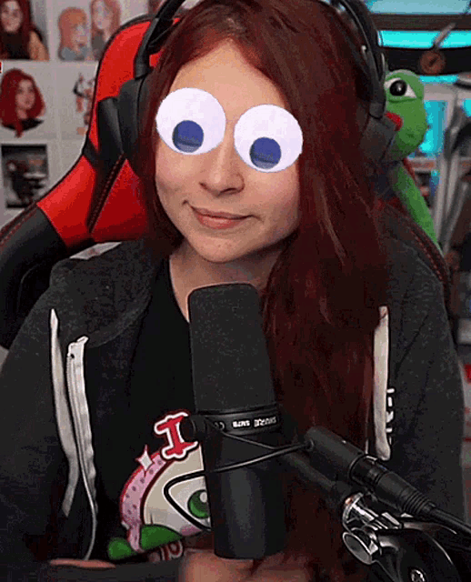 a woman wearing headphones and a shirt that says i on it