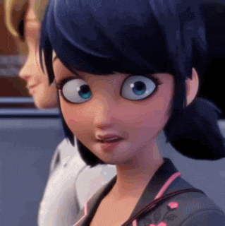 a close up of a cartoon character 's face with a surprised look on her face .