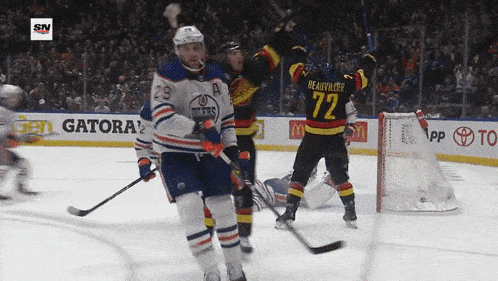 a hockey player with the number 72 on his back