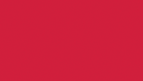 a stuffed cow with a pink nose and black ears is against a red background